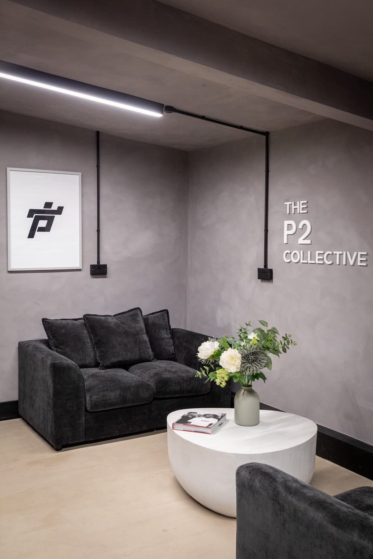 The P2 Collective sign in the lounge