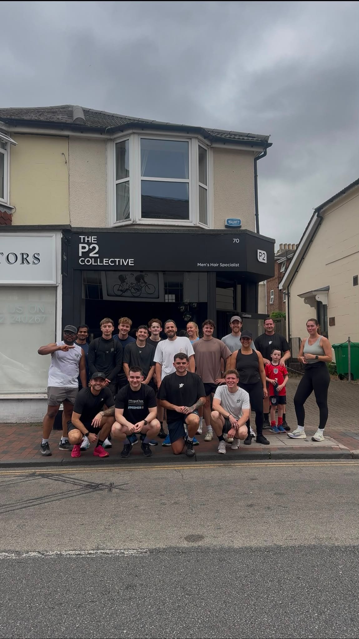 The run club and the P2 team outside the salon on Camden Road