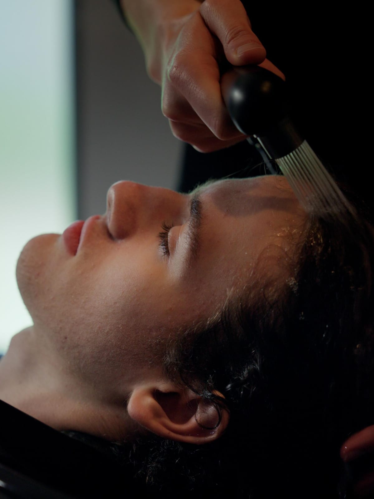 Hair being washed at the basins at The P2 Collective